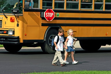 bigstock-Children-Getting-Off-The-Bus-874361