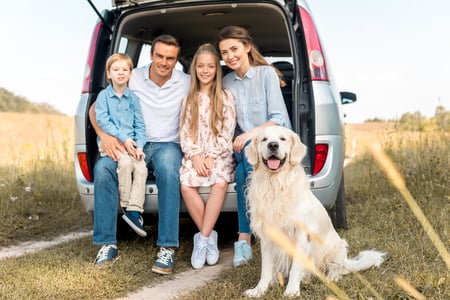 bigstock-Happy-Young-Family-With-Retrie-260554108