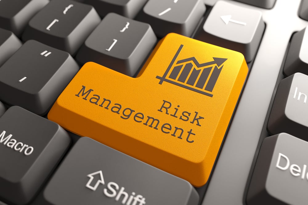 Orange Risk Management Button on Computer Keyboard. Business Concept