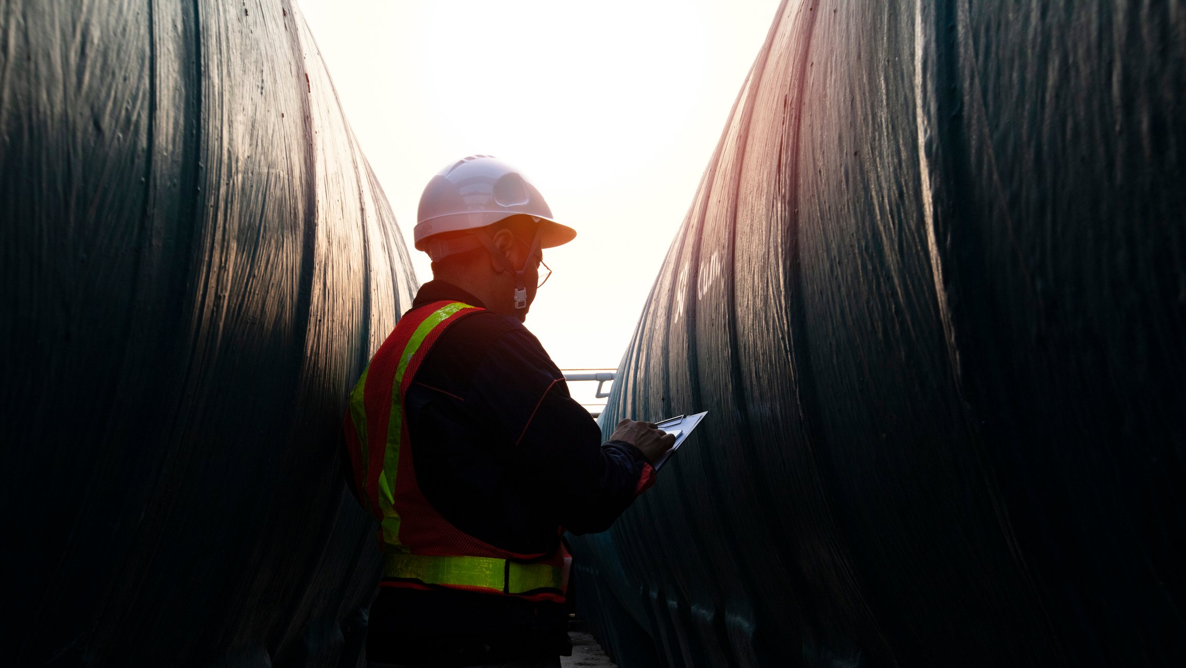 Engineer in full PPE doing inspection at jobsite