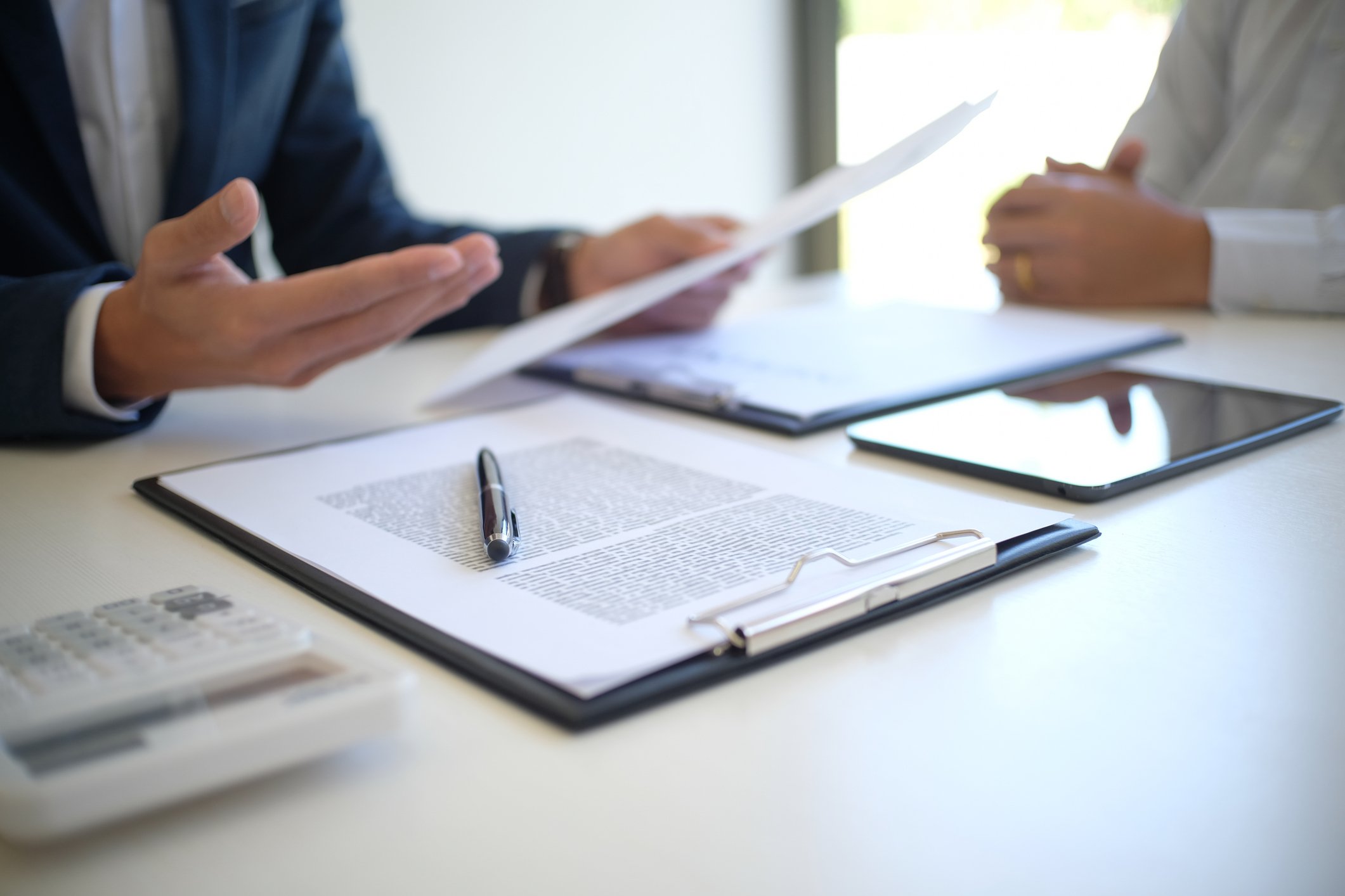 Man reviewing documents with a client