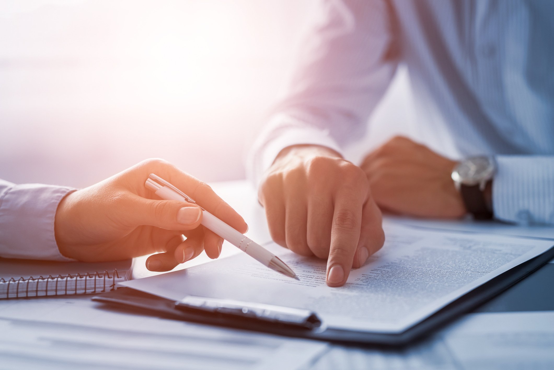 Business people reviewing documents